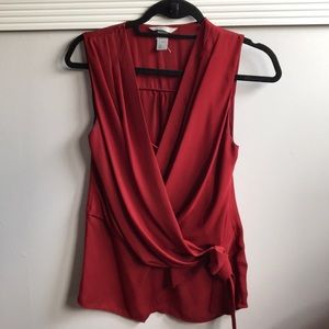 Red sleeveless blouse